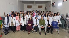 AIDM students conduct dental screenings at Malir Cantt school