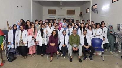 AIDM students conduct dental screenings at Malir Cantt school