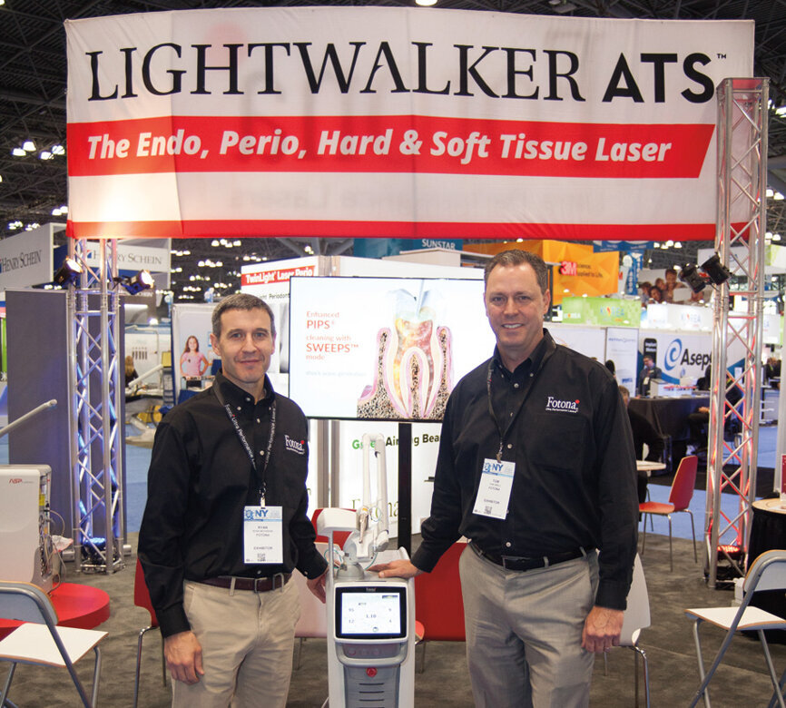 Ryan and Tom of Fotona. (Photo: Jahmel Charles, Dental Tribune America)