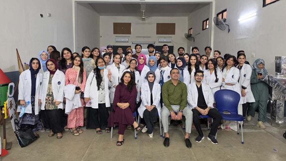 AIDM students conduct dental screenings at Malir Cantt school
