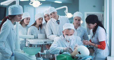 Are haptic dental trainers better than phantom heads for dental curricula?