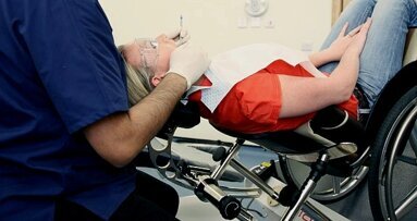 Dental chair simplifies treatment of physically handicapped