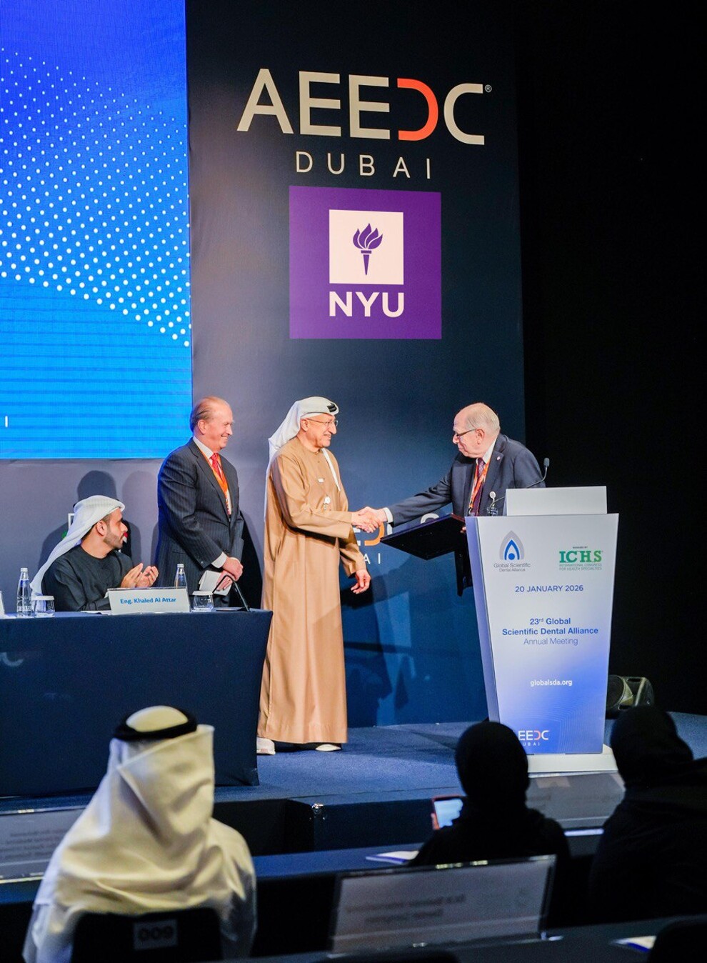 Prof. al-Madani receiving his award at the Global Scientific Dental Alliance meeting from New York University.
