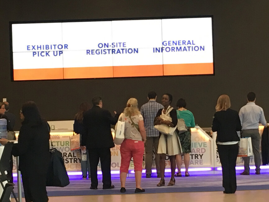 Attendees wait in line to pick up their badges and get registered for the AGD2019, held at the Mohegan Sun in Uncasville, Conn.