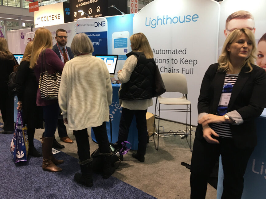 Meetin attendees stop by Lighthouse for more information on the company’s offerings.