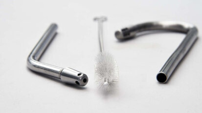 Dental students design metal saliva ejectors