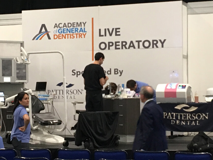 For the first time at an AGD meeting, a live operatory resembling an actual dental office has been constructed in the exhibit hall, allowing attendees to see how the latest equipment is used as a clinician performs cutting-edge procedures on a live patient while another clinician narrates. 