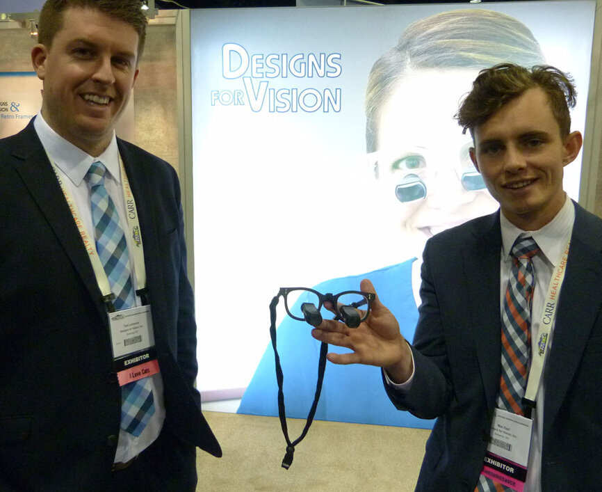 From left in the Designs for vision booth are Tom Lartonoix and Mike Zapf.