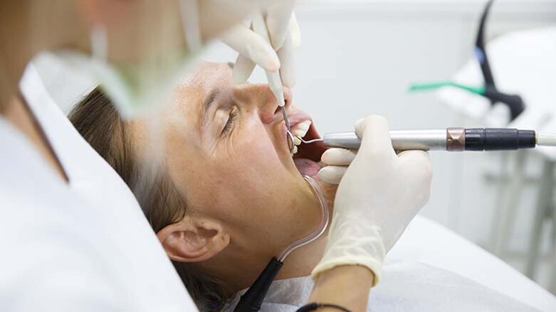 Root canal therapy versus dental implant