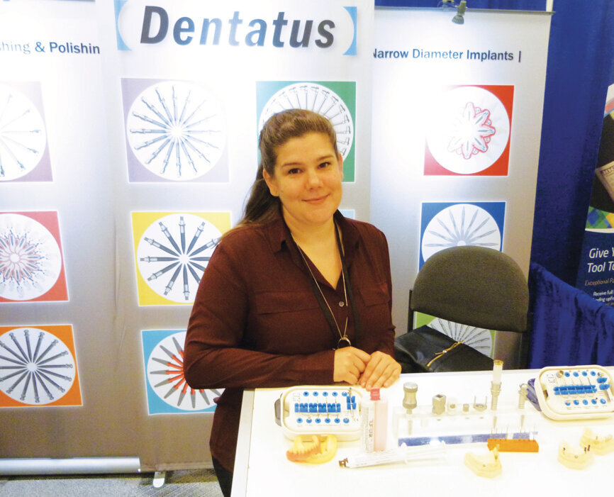 At the Dentatus booth, Denise Manekas speaks about the company’s narrow diameter implants and many other innovative products. Photo by Sierra Rendon/DTA