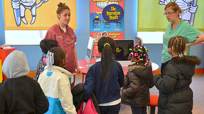 Pediatric dental students teach oral health skills to youngsters