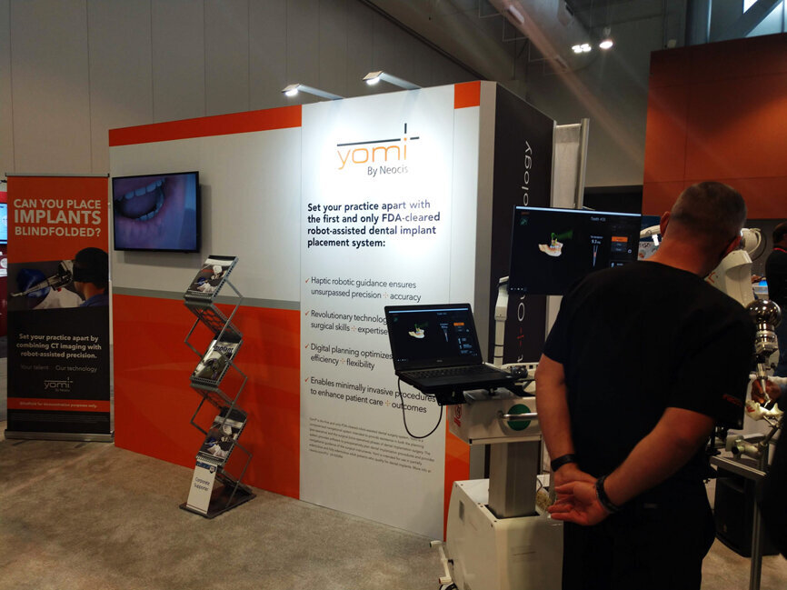 Yomi, developed by Miami-based health care startup Neocis, is on display at AAOMS.