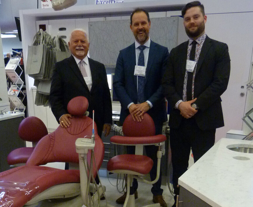 From left, Réjean Girouard, Cameron Krempulec and Gabriel Dufort in the Midmark booth.