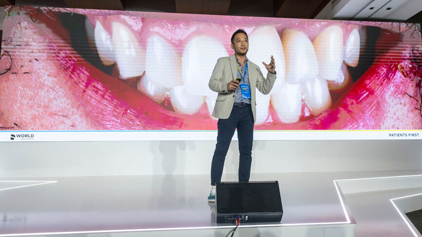Dr Ricardo Tanaka spoke during the plenary session, taking attendees on a journey through a complete digital flow. (Image: Dentsply Sirona)