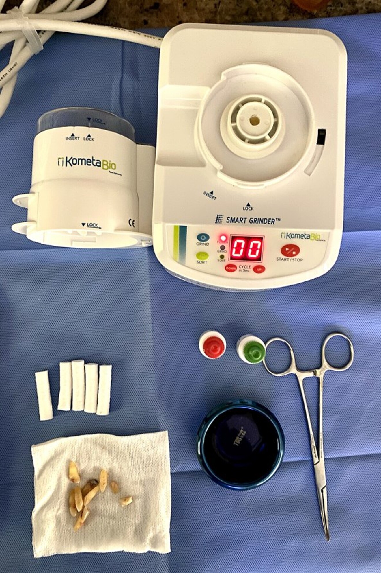 Fig. 12a: Smart Dentin Grinder and extracted teeth.