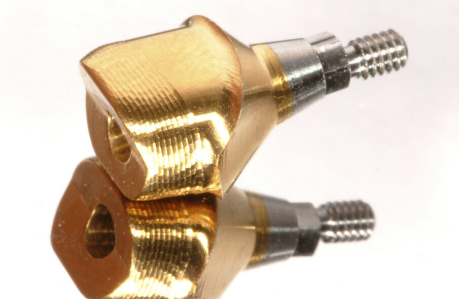 Fig. 11: The Atlantis abutment in gold-shaded titanium, together
with the Atlantis abutment screw, was sent to the dental laboratory.