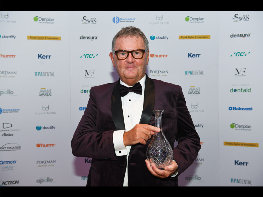 Prof Tipton showing his Lifetime Award copy