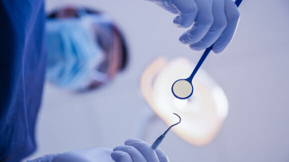 Infection scare dentist taken off register