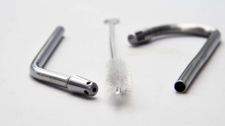 Dental students design metal saliva ejectors