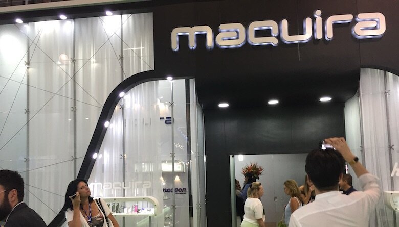 Entrance to the booth of Maquira, a company that manufactures restorative materials.