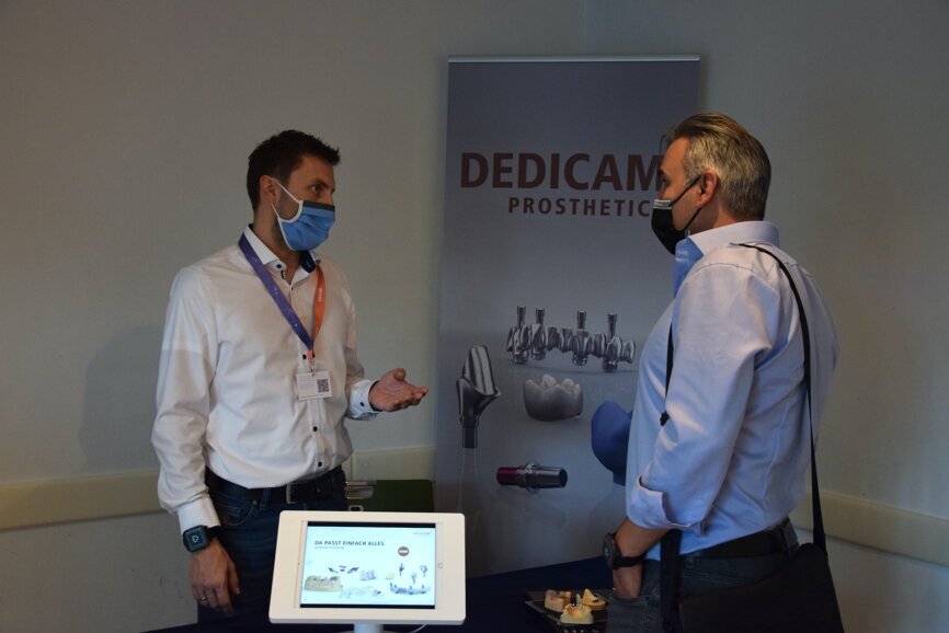 DEDICAM booth at exocad Insights 2020. DEDICAM is a Camlog brand and focuses on individual CAD/CAM prosthetics. (Image: Dental Tribune International)