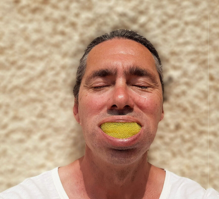 Product creator Chris Martin with the Blizzbrush, a sponge-like brushing device that thoroughly cleans teeth in far less time than traditional brushing.