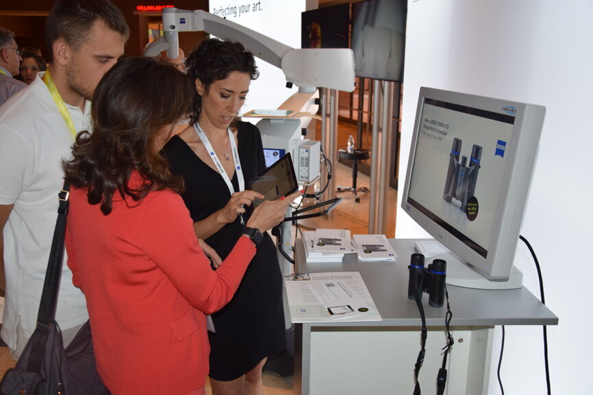 An attendee being shown the benefits of digital dentistry.