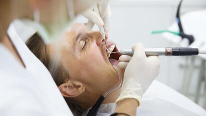 Root canal therapy versus dental implant