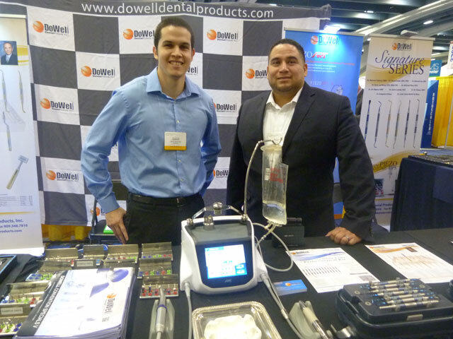 David Mendiela and Ricardo Gonzalez stand ready at the DoWell booth.