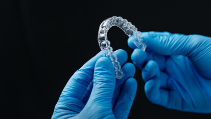 A non-surgical orthodontic approach using clear aligners in a Class III adult patient