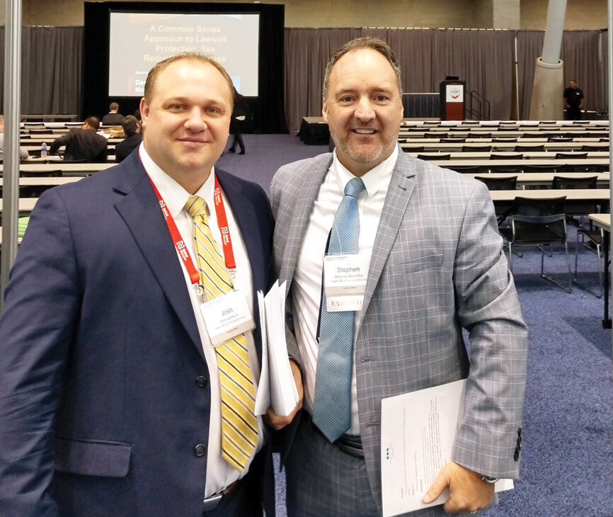 Be sure to check out the product theater, like these two attendees, to learn more about some of your favorite exhibitors. 