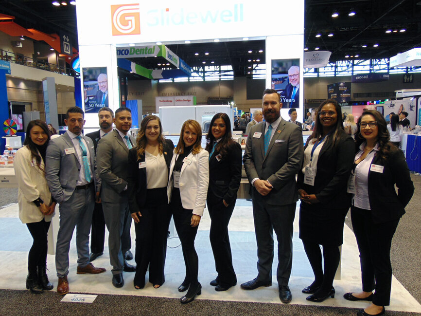 The folks at Glidewell stand ready to provide assistance to meeting attendees here in Chicago. 