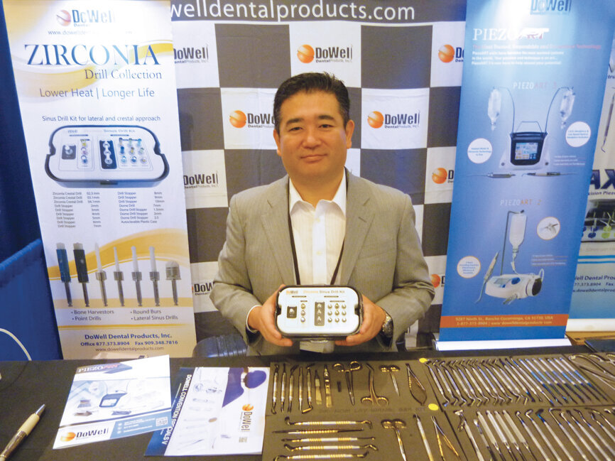 Kazu Tanji displays the DoWell Zirconia Sinus Drill Kit. Photo by Sierra Rendon/DTA