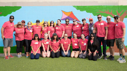 Volunteers build a playground and provide free dental care to children