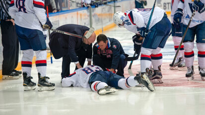 Dangers of contact sport: Hockey player’s incisors stuck in lip