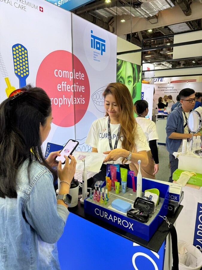 IDEM Singapore Curaden booth