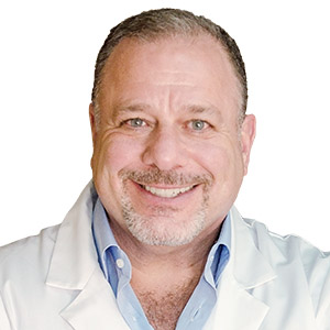 Dr. Paul Petrungaro DDS, MS, FICD, FACD, DICOI